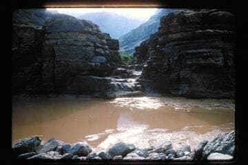Across river into mouth of Three Springs Canyon
