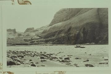 The launch going up Aztec Rapid at the mouth of Forbidding Canyon