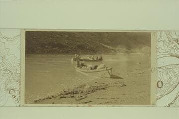 Our flotilla at the Crossing of the Fathers--photo and caption by Lewis R. Freeman from his collection. The LaRue junket stopped at the Crossing 1922, Sep. 13, but were unsure of the location