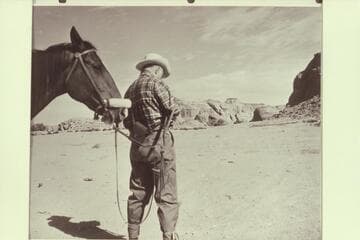 Archeyes Masland eyeing Octagon Butte for a possible arch.  From area of Manygoats place in Navajo Canyon