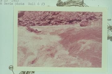 Bill Davis ending a run thru Rapid 22, Mile 202.35.  [on photo reverse:  Mile 200, Cataract Canyon.  Bill Davis making the run.  Fern on right bank]