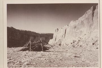 Wreck of pole and brush miners' cabin; Mile 108, east side.  Down river from Schock Bar