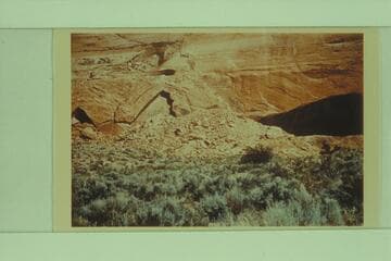Face of canyon behind Dr. Schock dugout and fireplace.  "A" type cleavage at left of picture is guide to location of fireplace