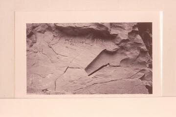 Painted inscriptions at Mile 182 1/2 below Dark Canyon. Note Hervig name
