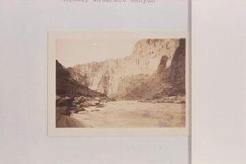 Down river from approximately Mile 202.8 opposite the mouth of Teapot Canyon.  Print sent by A. G. Sutro.  Caption written on back of print:  "Midway Cataract Canyon"