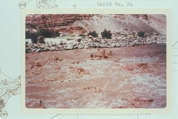 Jean and Hal Bennett in Rapid 21 of The Big Drop at the mouth of Teapot Canyon in Cataract Canyon