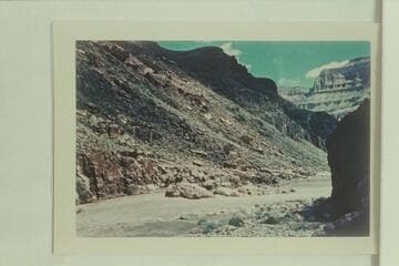 The bedrock in Bedrock Rapid.  The Hatch-Dines party looked over the rapid about ten minutes before running it.  The pontoon hit the point of the bedrock and stayed there