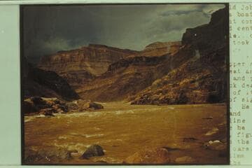 John Harper in the "Norm" in Bedrock Rapid after being thrown to the left of the rock in his first run in the "Mexican Hat III"