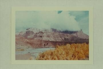 Storm draped butte from below Idas Riffle. Filming of Disney's "The Colorado River Story."