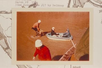 Dock Marston and Helen Stiles being lightered from Tex's jet boat to an island after the jet had grounded. The Portal