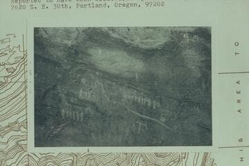 Inscriptions on boulder at Mile 212 1/2 left bank about 1/4 mile from the edge of the river and 600 ft. above the river level