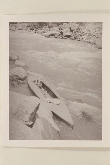 The folding kayak "Rob Roy" bailed out after nearly swamping at head of Gore Canyon. Gore Canyon drops a maximum of 110 ft. to the mile. Leich portaged the major part of it