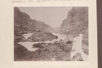 Down river from Mile 203.9. Photo is captioned, "Railway Survey, Colorado River, 1889. Camp 18."