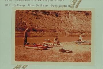 Stowing gear for the going through Cataract Canyon in Sportyaks.  Camp below the mouth of Butler Canyon.  Mile 212.8.  Bill Belknap, Buzz Belknap, Dock Marston