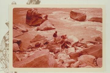 Dock Marston and Buzz Belknap examine the H. McD and the J. Best inscriptions.  Mile 204 1/2, right bank