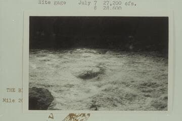 Head of Rapid 22, Mile 202.4. #22 by Clyde Eddy's book, p. 76. We ran near the right side about 20 to 25 ft. right of the hole, Bill and Fern Davis. Cataract Canyon upset. Mile 202 1/4, Cataract Canyon, Flipped over backward. Went thru extreme rt. #1