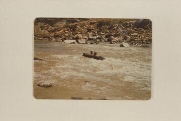 5th Rapid, Mile 210.5. Frank McKeown and George Simmons riding the "Jeff Davis"