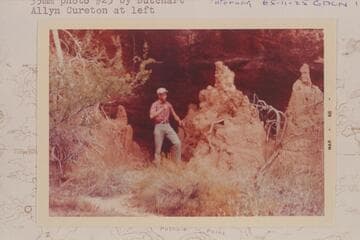 Clay left in front of Seep spring about a mile below the mouth of Havatagvitch Canyon on the right bank of Supai.  Allyn Cureton at left