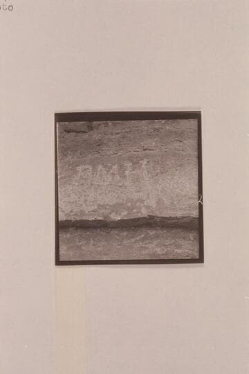 The inscription cut by Langdon Gibson over the grave of Peter M. Hansbrough. Near President Harding Rapid in Marble Canyon; Mile 44