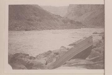 Buzz Holmstrom's portage in Cataract Canyon at rapid which he numbered 16.  Between Miles 202 and 203.  Rapid No. 23 in the Chenweth-Hoyt table.  Heads at Mile 202.30 and drops 9 ft. in .15 miles