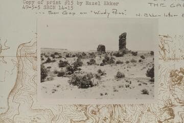 Two of the standing rocks near Lizard Rock or The Moon. The near rock is The Wall. The Gap in distance. "The Gap or Windy Pass"--Hazel Ekker letter, 1966, Aug. 13