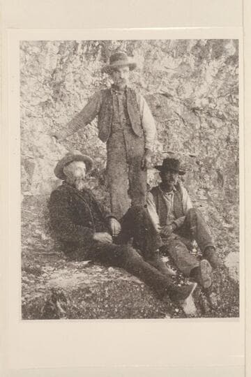 "Dad," John, and W. W. Bass.  The center figure is John Waltenberg