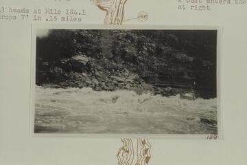 Rapid No. 43. A boat enter the rapid at right