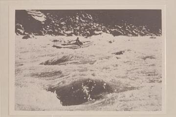 Don Harris piloting the "Mexican Hat" through Hance Rapid
