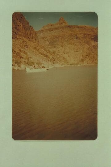 The Nevills San Juan punt in use in the Mexican Hat-Lees Ferry trip. A guess places this below Grand Gulch--PTR (Reilly, P. T.), 1958, Aug. 28. This punt was later known as the "Whitey."