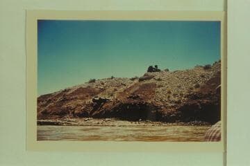 Old boiler at top of gravel bar and discharge pipes below Zahns Camp. San Juan River