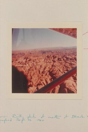 Across the jointed country between Anasazi and Nasja Creeks to the San Juan Canyon. The mouth of Cha Canyon is at upper right and Cedar Mesa is on the skyline