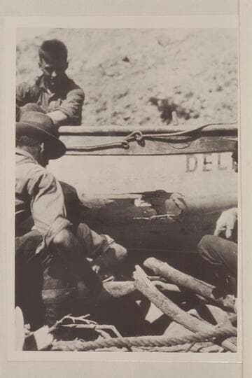 The hole punched in the "Dellenbaugh" while lining Rapid #5 near the head of Cataract Canyon, Mile 210.  Calloway above