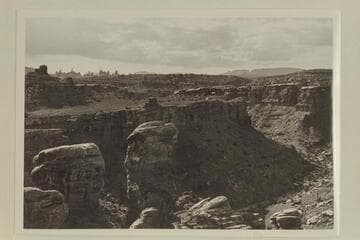 Butler Canyon looking south from the divide between Cyclone Canyon and Butler Canyon. The Pot Bellied Cowboy stands on the skyline at upper left