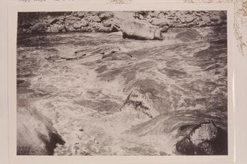 Ellsworth Kolb in Rapid 22.  Copy of print in Lint album.  Copyright mark indicates the photo is by Emery Kolb