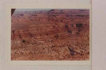 North from east of Cataract Canyon at approximately Mile 213. Junction Butte is upper center. Candlestick Tower is upper left