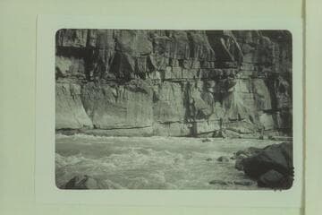 Bill Davis in Triplett Rapid. Photo from left bank