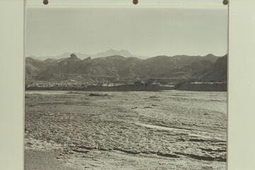 Virgin River Valley, Nevada.  Shows stream bed, gravel bluffs on East side of river and Virgin Peak in distance
