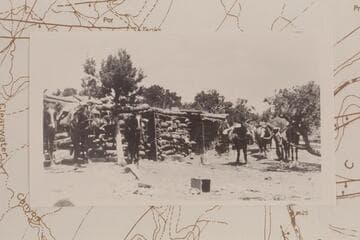 Camp Flint near Lands End on Todilto Formation. Ned Chaffin is at right. Horses: Cox, Coly, Spud, Fan, Baldy, Pinto. Pinto was favorite saddle horse of H. W. C. Prommel