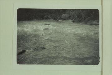 Bill Davis pulling out below Triplett Rapid. Photo from left bank