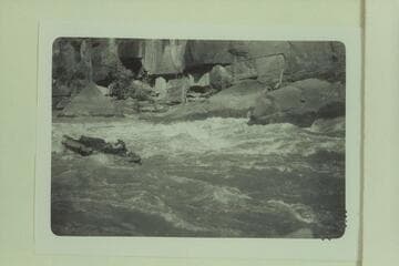 Bill Davis in Triplett Rapid. Photo from left bank