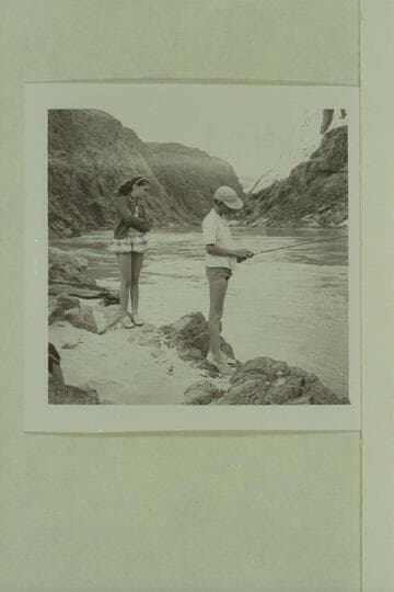 Debbie watches Jeff at the serious business of cat fishing; Separation Canyon