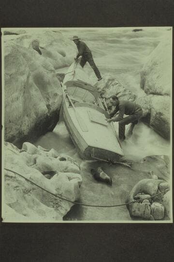 Lava Cliff Rapid, Mile 246.  The USGS party arrived at the rapid Oct. 11, 1923 and portaged it Oct. 12, 1923.  One of the boats appears moored at the shore