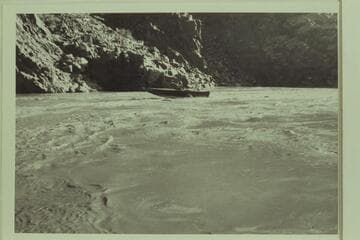 #1:  The "Up Colorado" running upstream a mile or two above Bridge Canyon (?)  Crew:  Al Ross, Engr, USBR; Les Pampel, Engr, USBR; Harry Aleson, pilot.  Photo #2 is a short distance upstream from this photo
