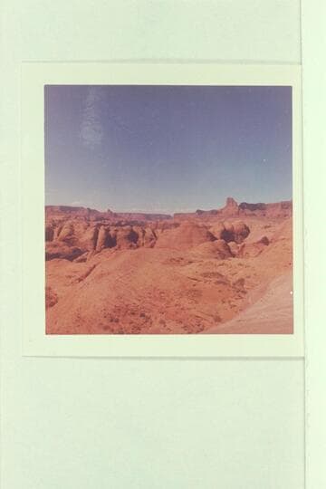 Anasazi Canyon in middle distance; Glen Canyon in distance. Lion Rock. Cummings Mesa on skyline at left. From near top to west of the head of the joint