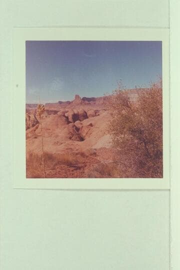 Route into Anasazi Canyon which is middle distance.  Glen Canyon is beyond.  Lion Rock and Fifty Mile Mountain on skyline