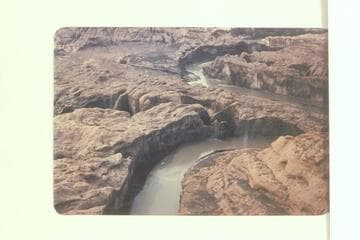 Looking southwest and downstream on Colorado to side canyon referred to as Mystery by Nevills