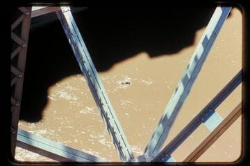 Butchart floats under bridge