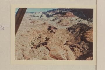 Small drainage heading in caves north of Butte 5014. Butte 6069 is upper right