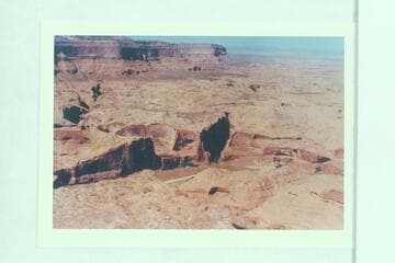 Hidden Passage at left. Fifty Mile Mountain upper left. Boulder Mountain is the blue line at upper right. Lower center is Music Temple