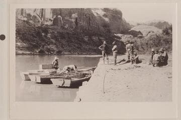 Cataract Canyon party and boats at our Camp Junction. USGS San Juan survey--used as Exhibit No. 387 by Complainant in River Bed Case